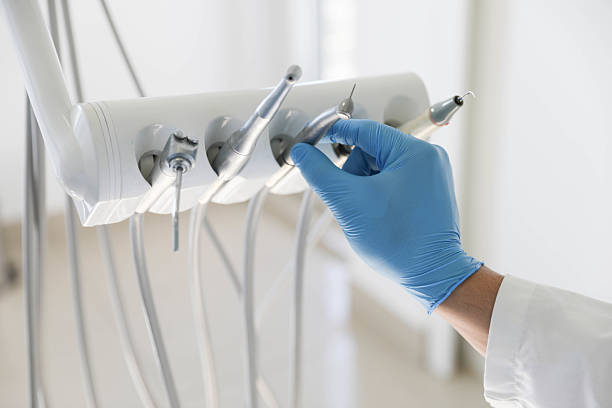 Professional Dental Implants technician working in Macon County County, NC